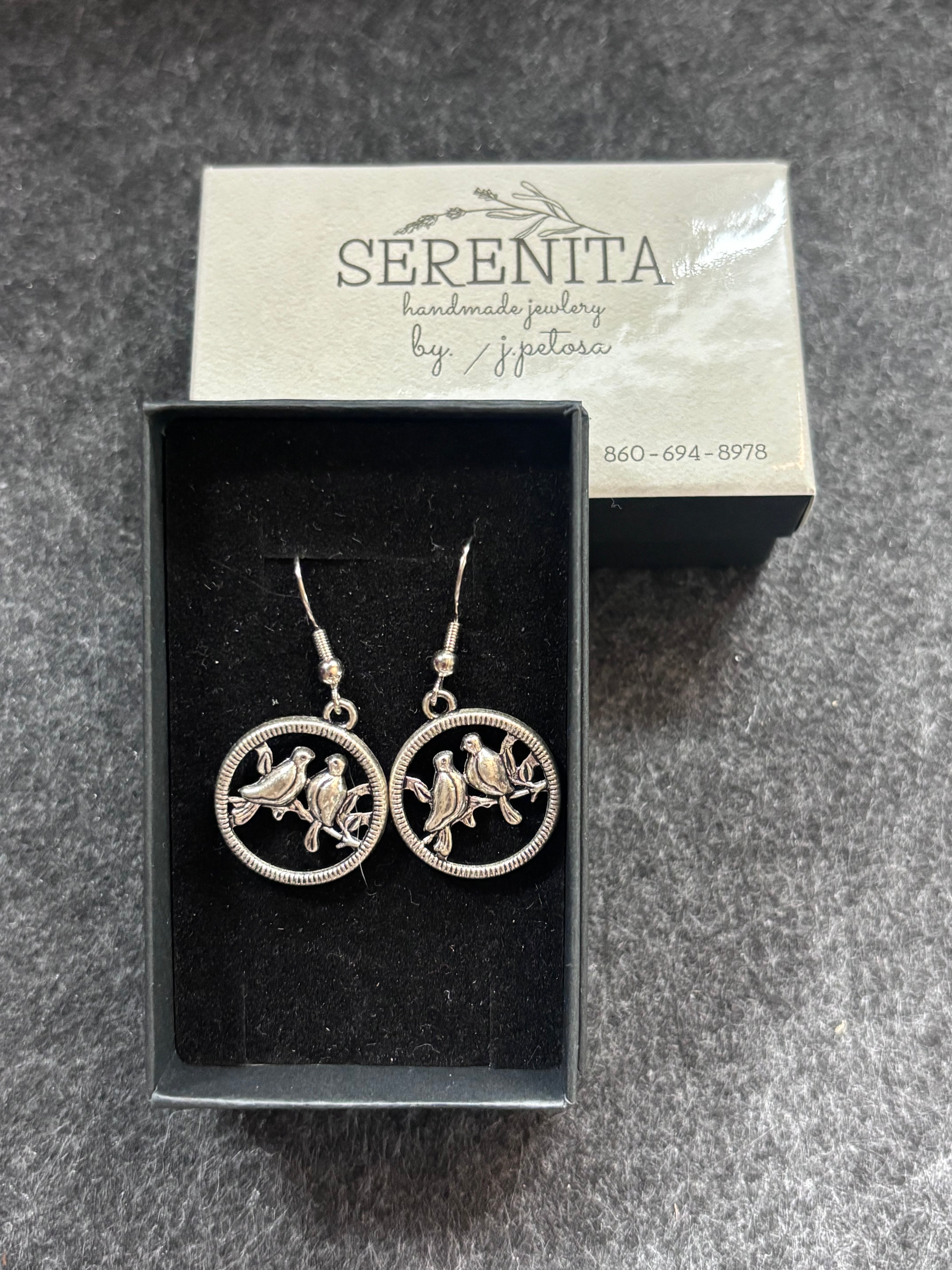 Beautiful silver tone bird earrings